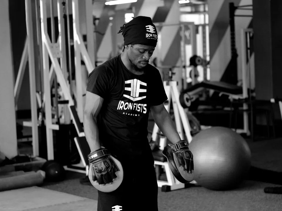 Iron Fists coach leading a strength and conditioning session